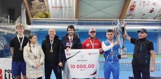Drużynowe Mistrzostwa Polski PLT - na zdjęciu 6 mężczyzn i kobieta, dwóch mężczyzn trzyma puchar.