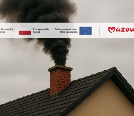 dach z dymem z komina